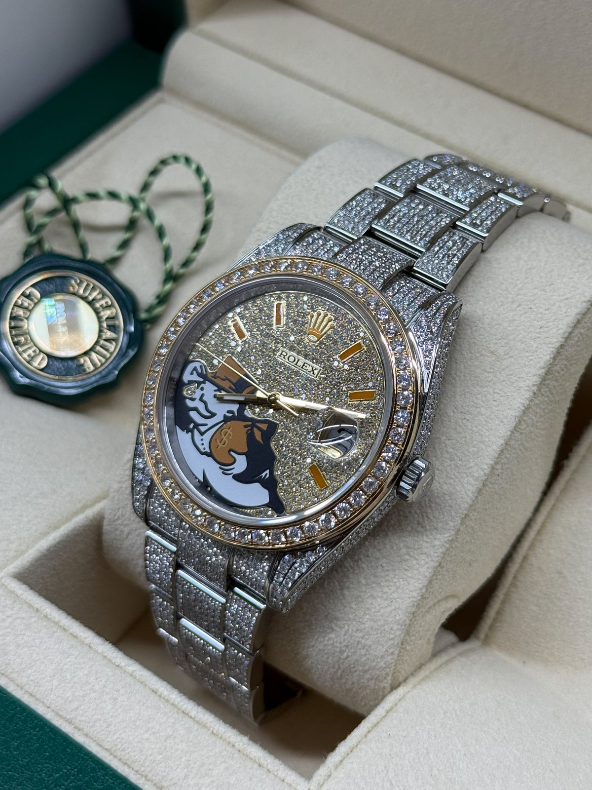 Iced out Rolex Datejust 41 with Monopoly Man dial and 18K yellow gold bezel