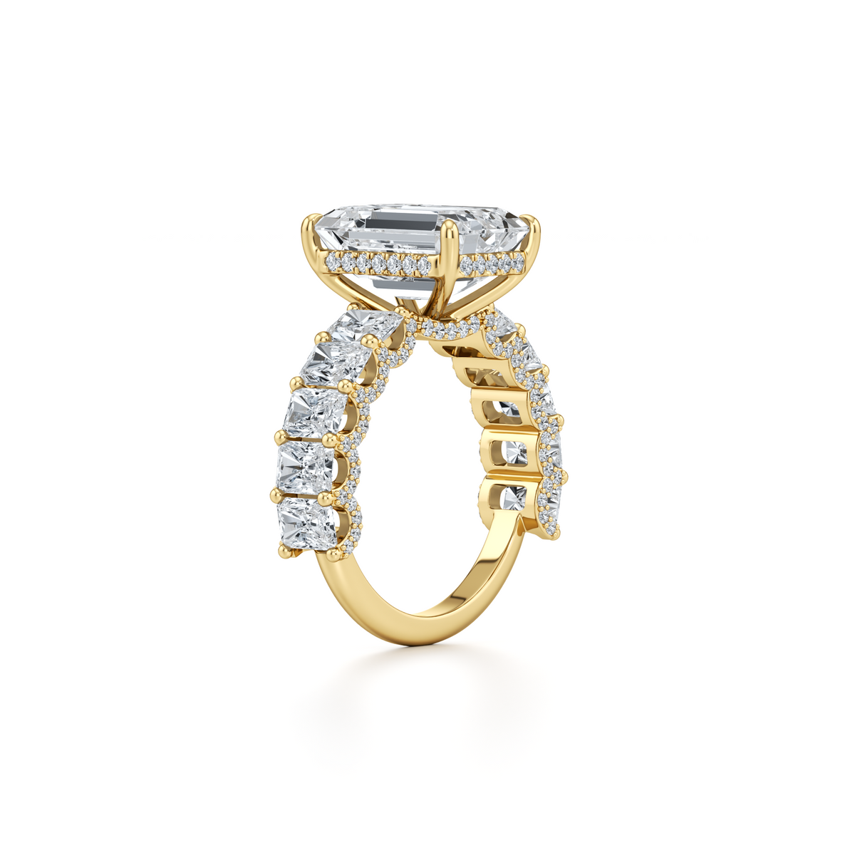 6.31 carat emerald lab grown diamond ring with emerald and round accent diamonds in 14K yellow gold