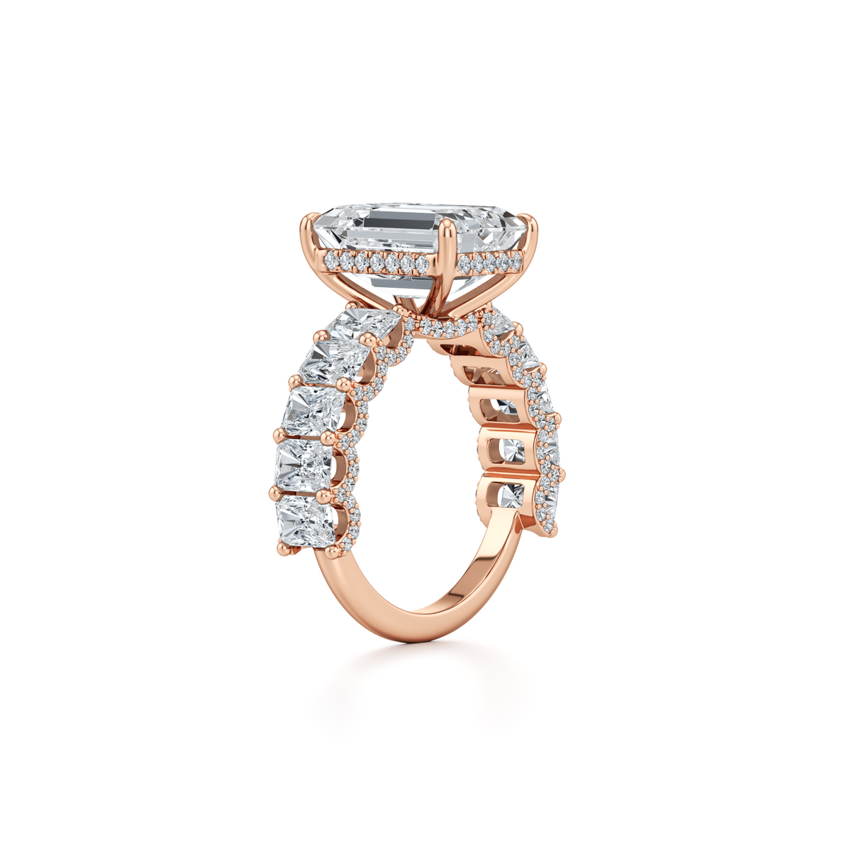 6.31 carat emerald lab grown diamond ring with emerald and round accent diamonds in 14K rose gold