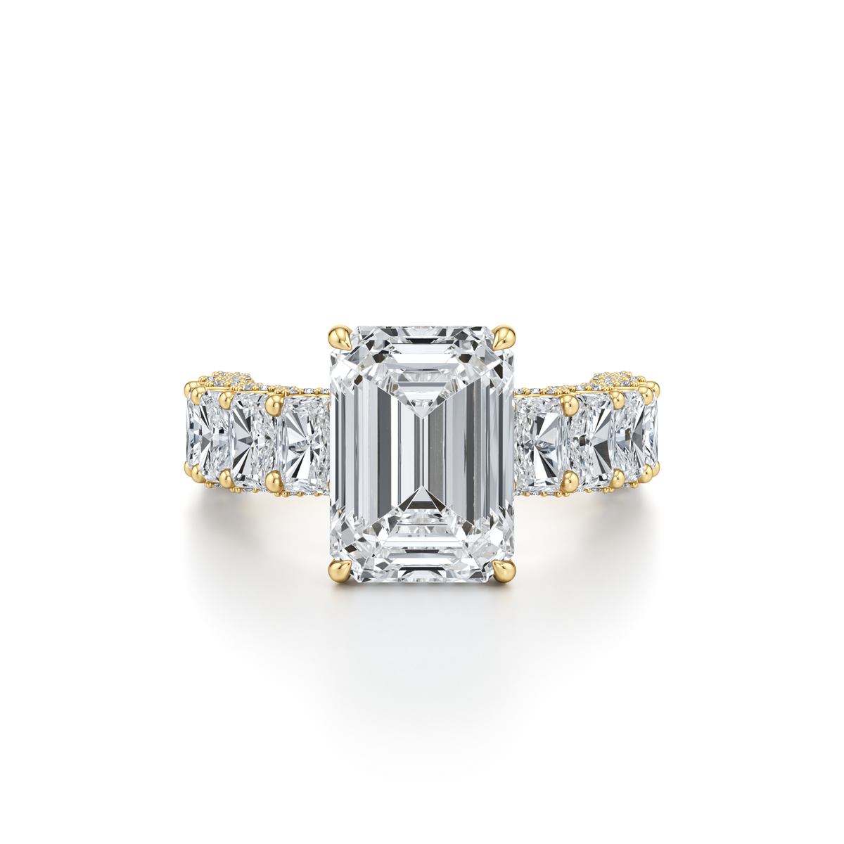 6.31 carat emerald cut lab grown diamond engagement ring with U-shank pavé in 14K yellow gold