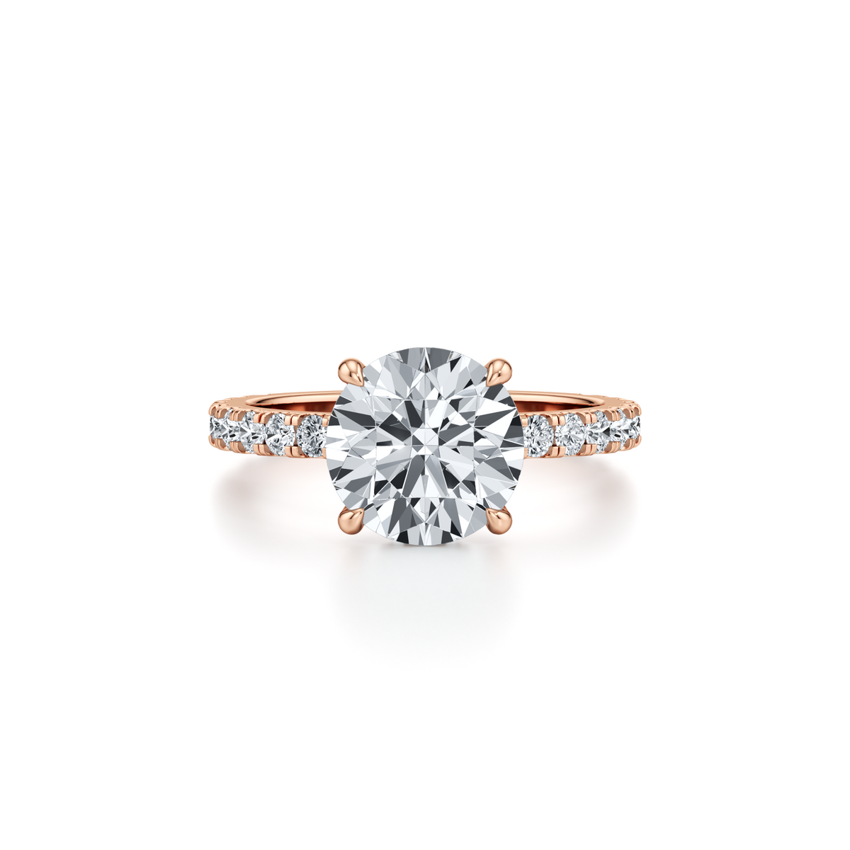 3.09 carat round lab grown diamond engagement ring with pavé band and hidden halo in 14K rose gold
