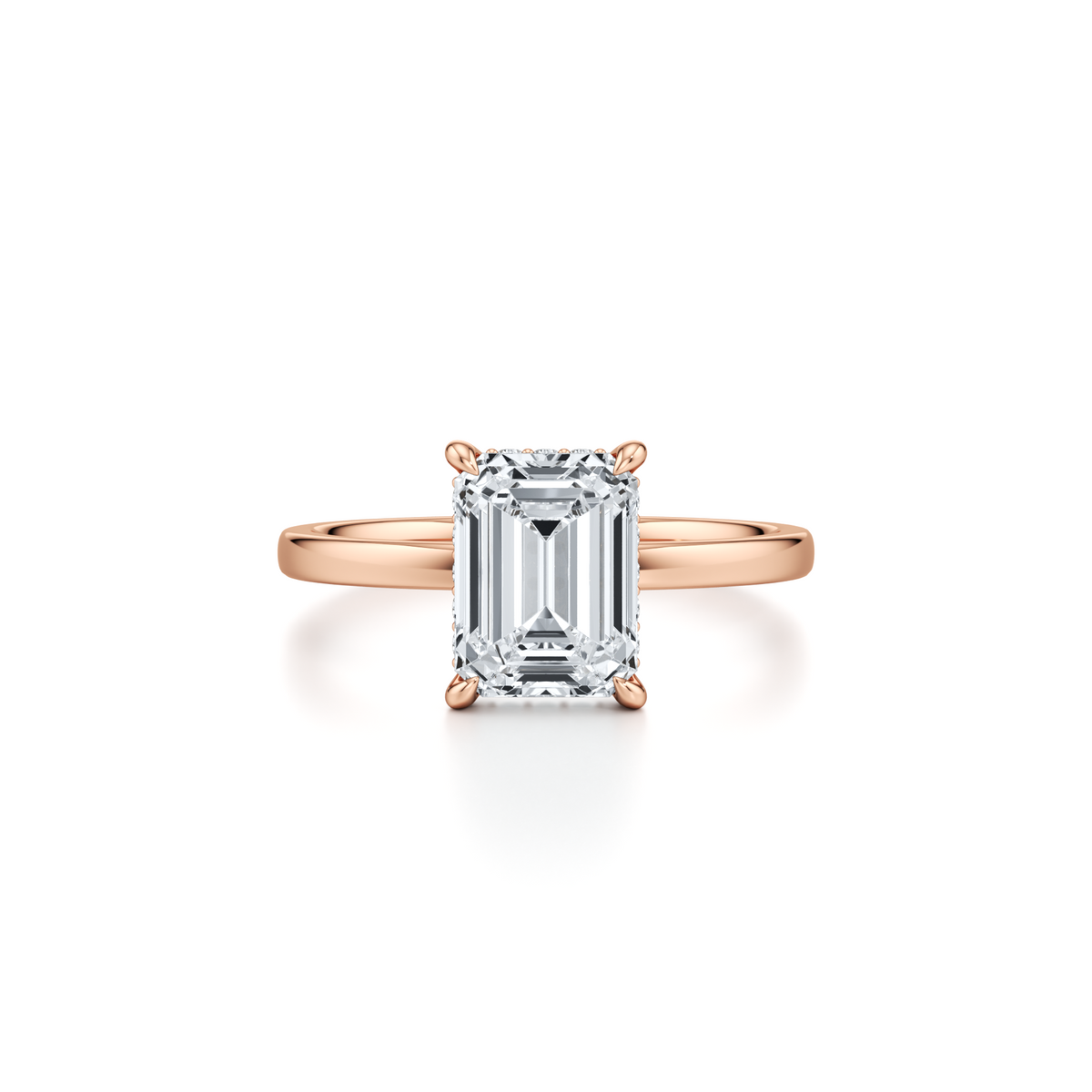 3.01 carat emerald cut lab grown diamond solitaire engagement ring with hidden halo in 14K rose gold